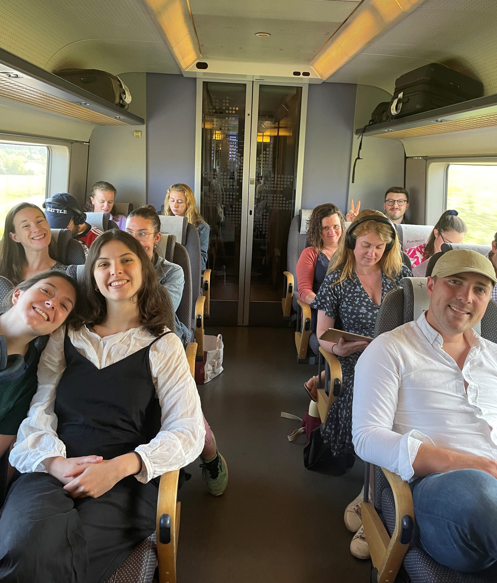 Anna (middle front row) on the train to Oslo with the choir.
